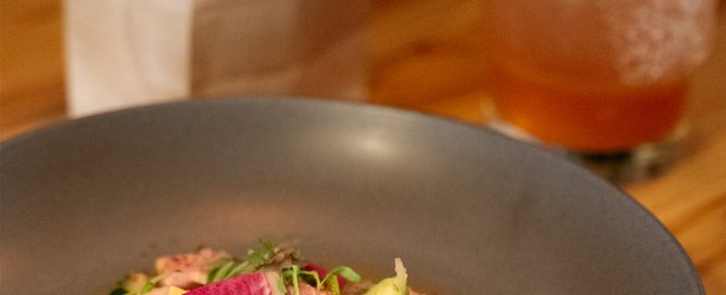 Bowl of the colourful Birdies Ceviche served alongside other dishes from Birdies Eats and Drinks