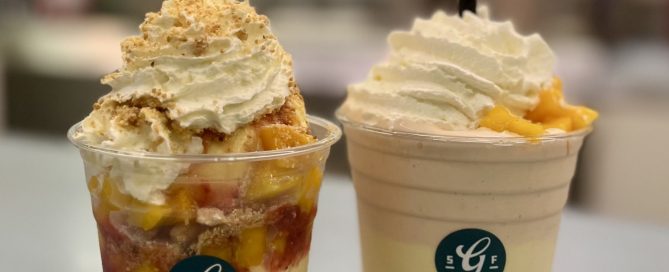 2 ice cream sodas with whipped cream