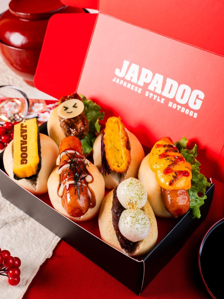 The six-piece mini JAPADOG Bento presented in a right red box