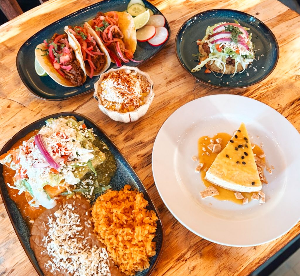 Selection of 5 dishes from Cantaritos arranged on a table